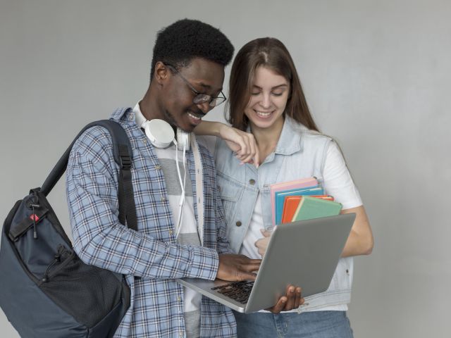 students-with-laptop-medium-shot